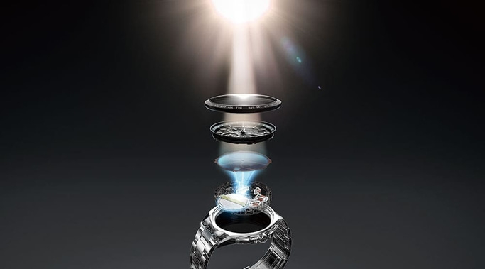 Explosionsansicht der Uhrkomponenten mit Lichtstrahlen und dunklem Hintergrund.