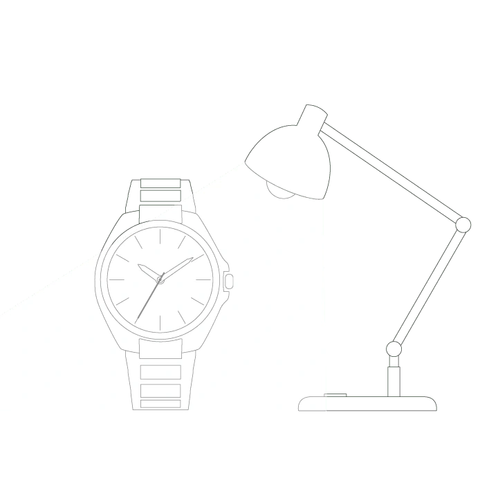 Uhr, die von einer Schreibtischlampe beleuchtet wird, die die Zeit anzeigt.