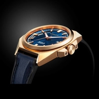 Goldene Uhr mit blauem Zifferblatt und Armband, Citizen Series 8 Automatic.