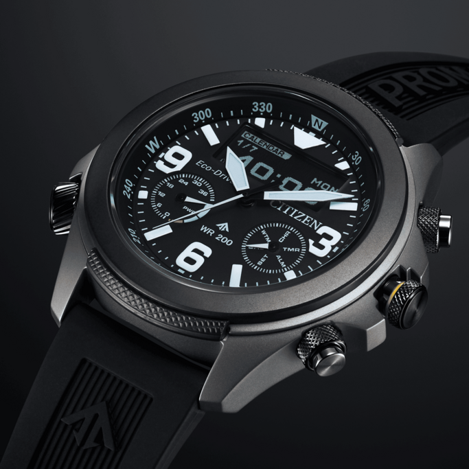 A close-up shot of a Citizen Eco-Drive watch, showcasing its detailed design with a black dial, digital display, and multiple buttons.
