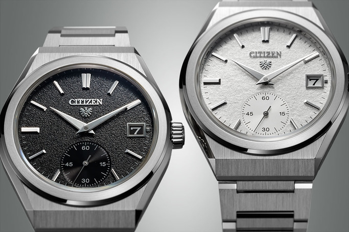 Zwei Citizen-Uhren mit strukturierten Zifferblättern und Datumsanzeigen, elegantes Design.