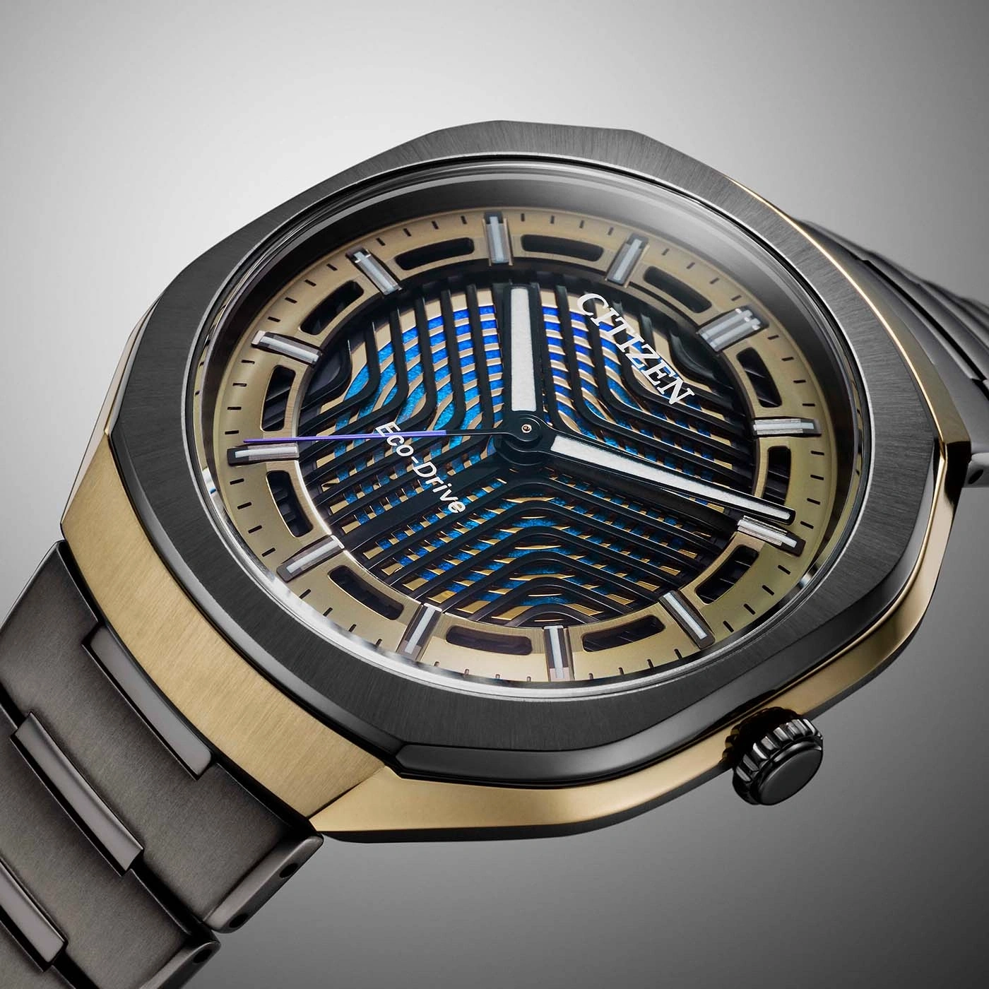 Eine moderne Citizen Eco-Drive Uhr mit auffälligem blau-goldenem Zifferblatt.