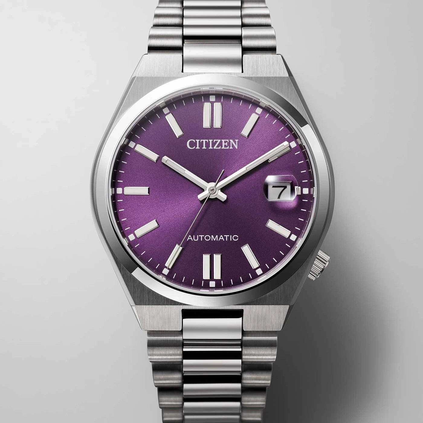 Citizen-Uhr mit lila Zifferblatt und silbernem Armband, Automatik.