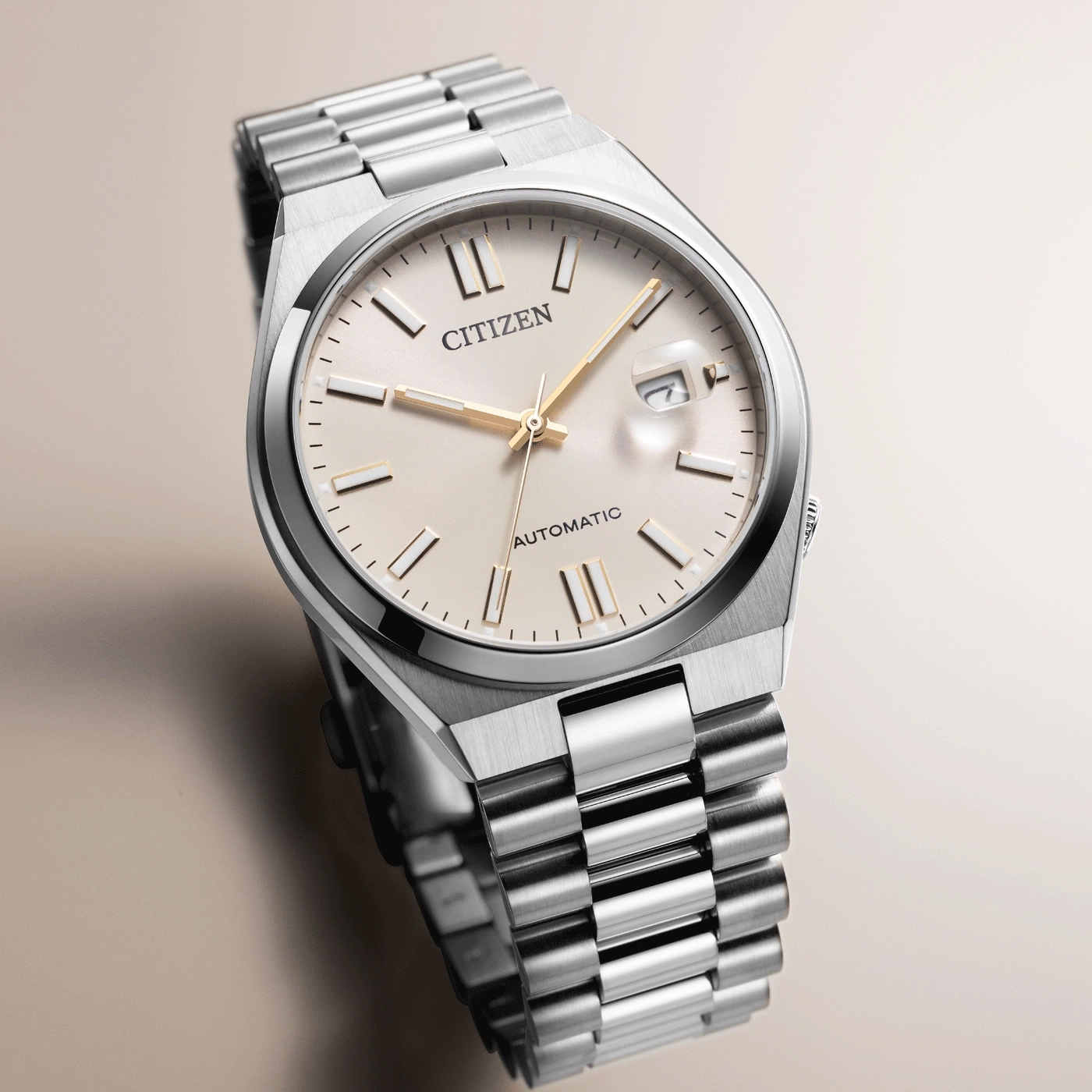 Citizen-Uhr mit silbernem Armband und cremefarbenem Zifferblatt, Automatikwerk.